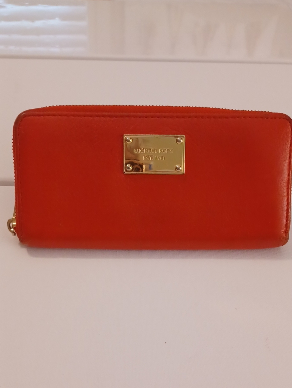 Michael Kors Orange-Red Zip Wallet with Gold Plaque